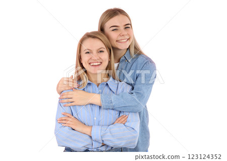 PNG, March 8. Two girls hugging, isolated on white background. 123124352