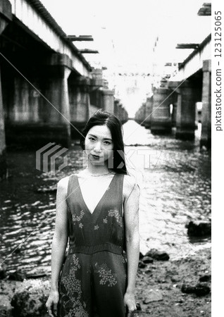 Woman posing in front of a retro background Woman posing in front of a retro background 123125065