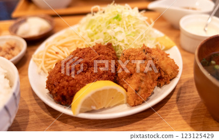 Delicious looking croquettes and fries Delicious looking croquettes and fries 123125429