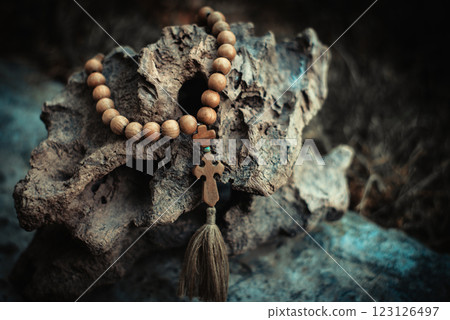Rosary with rhe cross and beads. Symbol of prayer and religion, christianity 123126497