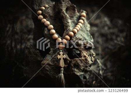 Rosary with rhe cross and beads. Symbol of prayer and religion, christianity 123126499