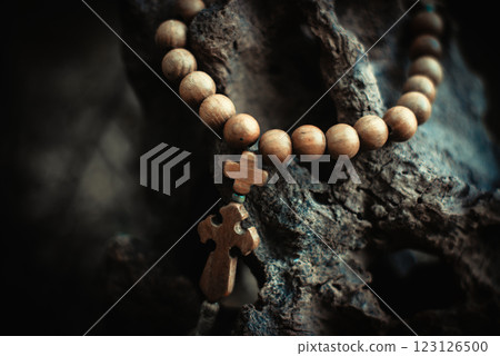 Rosary with rhe cross and beads. Symbol of prayer and religion, christianity 123126500