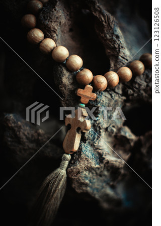 Rosary with rhe cross and beads. Symbol of prayer and religion, christianity 123126508