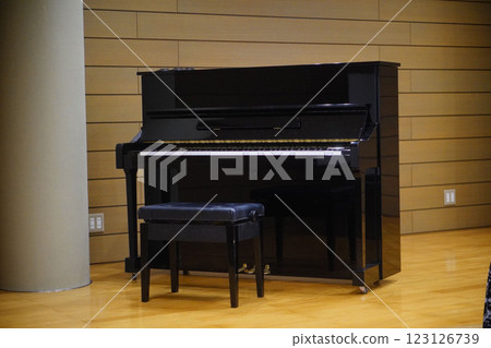 An upright piano installed on the presentation stage 123126739