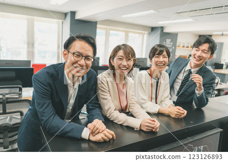 Colleagues working at the same company Colleagues working at the same company 123126893