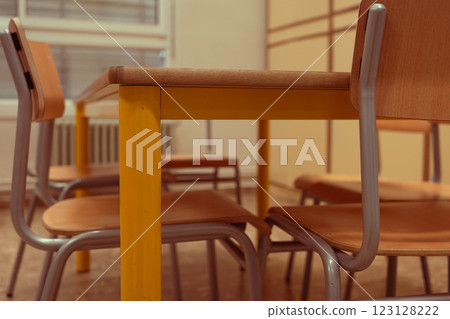 Colorful Classroom Setting with Wooden Furniture 123128222