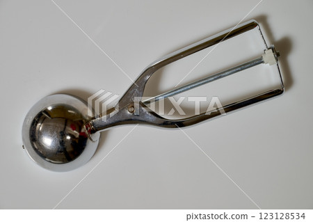 Ice cream stainless steel utensil on white backround 123128534