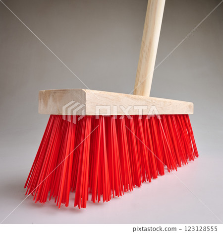 Clean Red street broom in studio light on white background Clean Red street broom in studio light on white background 123128555