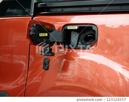 Open Diesel Fuel door and car key red car Open Diesel Fuel door and car key red car 123128557