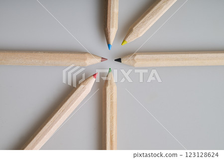 Six raw wooden colored pencils on white background Six raw wooden colored pencils on white background 123128624
