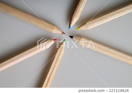 Six raw wooden colored pencils on white background Six raw wooden colored pencils on white background 123128626