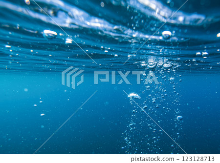 Bubbles rising in refreshing blue water (AI-generated image) Bubbles rising in refreshing blue water (AI-generated image) 123128713