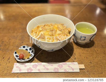 Oyakodon, pickles and brown rice tea set Oyakodon, pickles and brown rice tea set 123128785