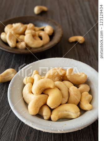 Cashew nuts on a small plate 123129434