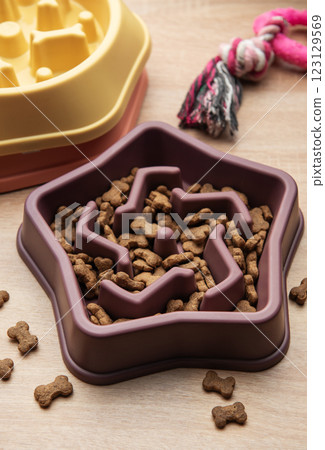 Slow feeding bowl preventing gulping and improving digestion in dogs 123129569