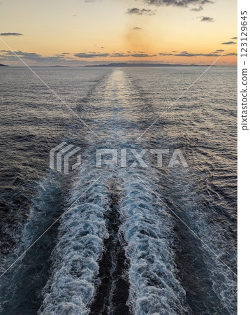 Sunset and wake 123129645