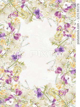 A spring flower frame combining violets and irises A spring flower frame combining violets and irises 123130178