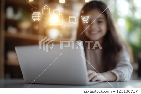 Shared moment: mother and daughter using laptop for online shopping, selecting items with digital icons, ordering products from marketplace, enjoying convenience of browsing, seamless shipping. Shared moment: mother and daughter using laptop for online shopping, selecting items with digital icons, ordering products from marketplace, enjoying convenience of browsing, seamless shipping. 123130717