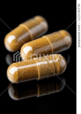 Turmeric: golden spice, ancient remedy, natural antioxidant, culinary ingredient, curcumin source, traditional medicine, health booster, vibrant powder, inflammation support, wellness enhancer. Turmeric: golden spice, ancient remedy, natural antioxidant, culinary ingredient, curcumin source, traditional medicine, health booster, vibrant powder, inflammation support, wellness enhancer. 123130736