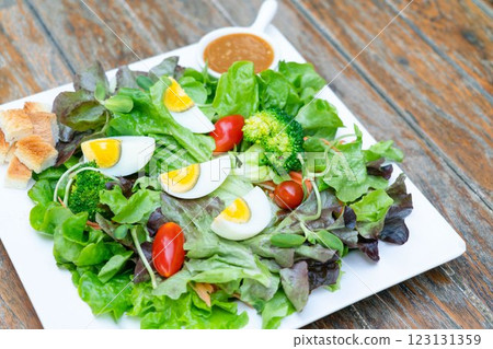 Boiled eggs with vegetables. Salad for diet food 123131359