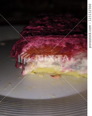 Dressed herring salad being eaten on christmas in prague Dressed herring salad being eaten on christmas in prague 123132568