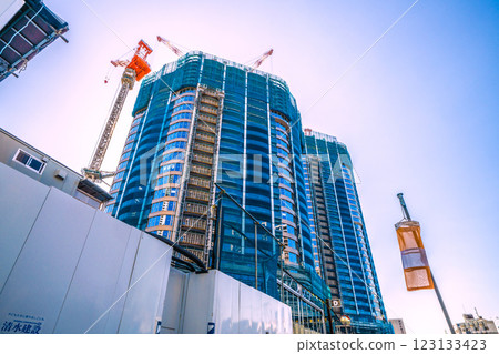 Tokyo cityscape in Japan - View of the Toyomi district and tower apartments under construction 123133423