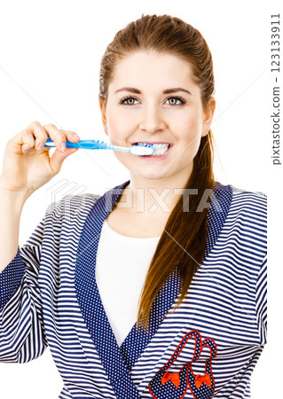 Woman brushing cleaning teeth. Woman brushing cleaning teeth. 123133911