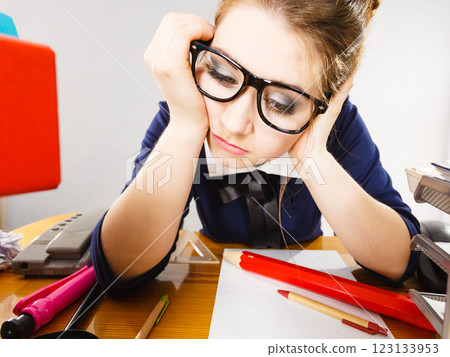 Sleepy business woman in office working 123133953