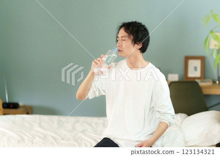 Middle-aged men drinking water 123134321