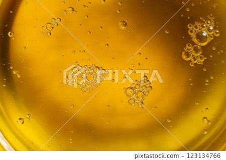 Unrefined cold pressed sesame oil in a glass bowl. Unrefined cold pressed sesame oil in a glass bowl. 123134766