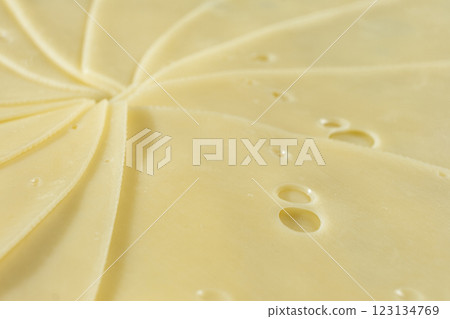 Semi-hard cheese close-up, thin slices Semi-hard cheese close-up, thin slices 123134769