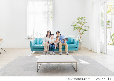 Family using tablets, gadgets and smartphones 123135214