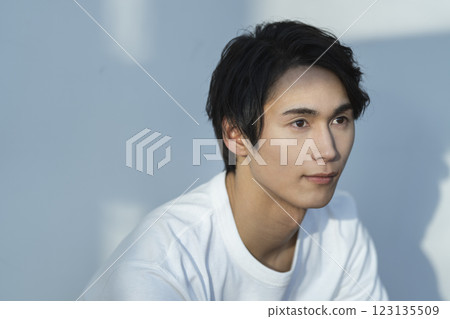 Men's beauty and skin care image: A man in his 20s wearing a white T-shirt Men's beauty and skin care image: A man in his 20s wearing a white T-shirt 123135509