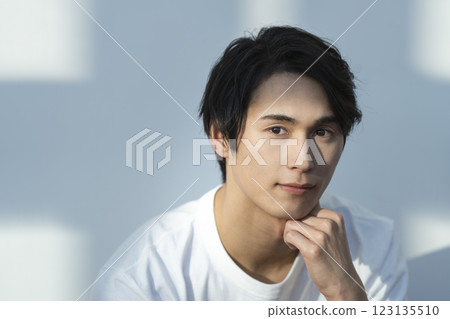 A man in his 20s looking at the camera Men's beauty Skin care image 123135510
