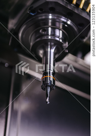 Precision CNC control in production, metalworking Precision CNC control in production, metalworking 123135904