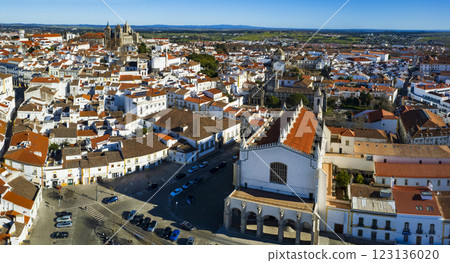 Portugal travel, medieval Evora town Unesco heritage site. Aerial panoramic drone view of down town , Bones Chapel in Sao Francisco Church and cathedral Santa Maria Assunta 123136020