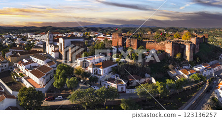 Portugal travel and landmarks. Historic town Silves with well preserved castle, former capital of Algarve. aerial high angle view 123136257