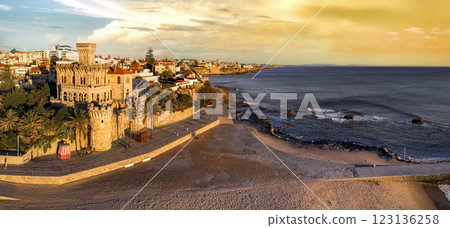 Portugal travel , scenic places. Estoril coastal town over sunset, Aerial drone view of sandy beach Tamariz and castle 123136258