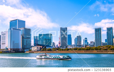 New landscape of Tokyo cityscape in Japan. "Emeraldas", Takeshiba, Hamamatsucho. Tokyo Tower and Azabudai in the background. Shiodome district on the right. New landscape of Tokyo cityscape in Japan. "Emeraldas", Takeshiba, Hamamatsucho. Tokyo Tower and Azabudai in the background. Shiodome district on the right. 123136903