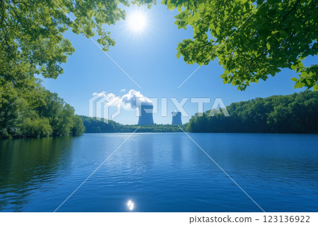 Nuclear power plant in the forest on the lake, sunny landscape 123136922