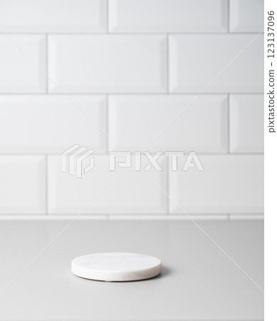Kitchen countertop with marble stand on white brick background. 123137096