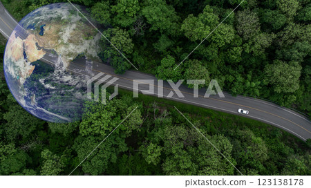 Aerial view EV car electric vehicle car alternative sustainable energy eco power,  EV car electric vehicle car on middle green tree forest road with globe earth planet, Alternative sustainable energy. 123138178