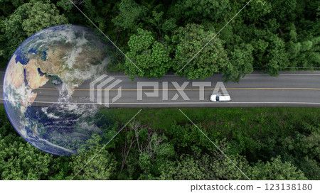 Aerial view EV car electric vehicle car alternative sustainable energy eco power,  EV car electric vehicle car on middle green tree forest road with globe earth planet, Alternative sustainable energy. 123138180