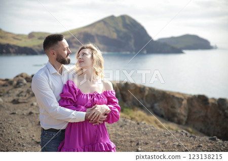 Couple embracing on cliff overlooking ponta de s o louren o in madeira 123138215