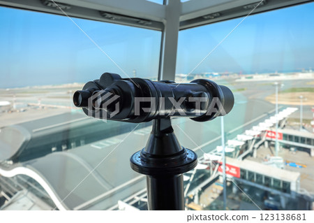 Observation Binoculars Overlooking Airport Terminal and Runways Dec 3 2024 123138681