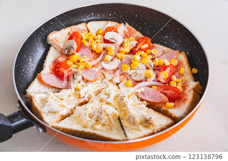 Pizza toast made in a frying pan Pizza toast made in a frying pan 123138796