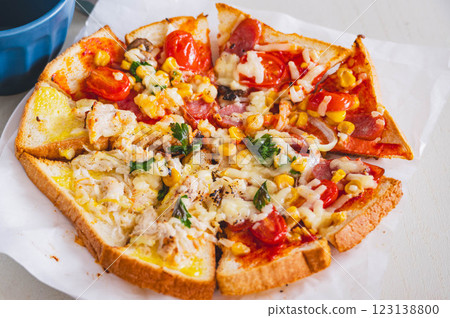 Pizza toast made in a frying pan with cheese 123138800