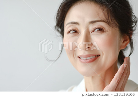 Portrait of a senior woman. Perfect portrait material for health, beauty and elderly skin care designs 123139106