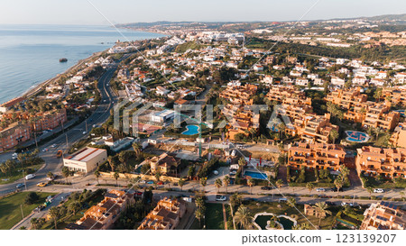 Scenic coastal mediterranean town with residential architecture and ocean views 123139207