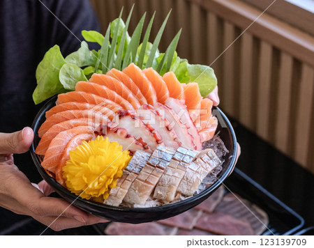Sashimi Sushi Set on Plate Delicious sashimi bowl with fresh fish and octopus. 123139709